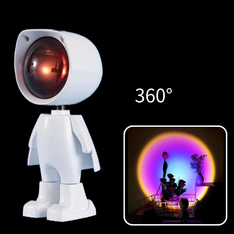 White robot-like lamp with a colorful light effect on a black background