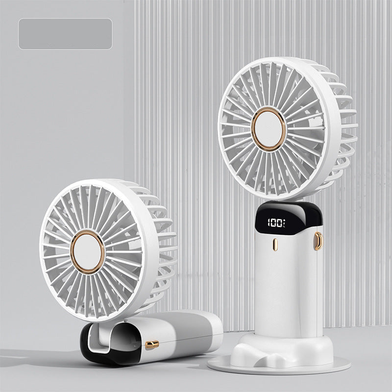 Two white handheld fans with digital displays on a gray background
