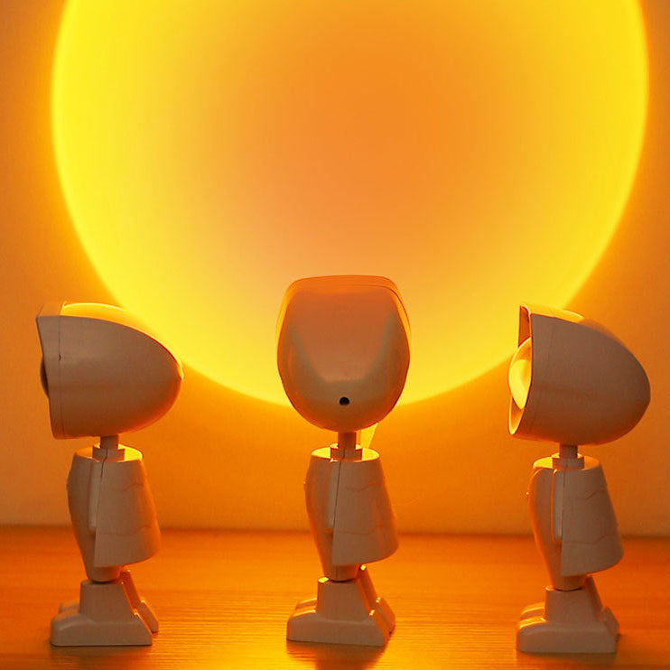 Three small robot sunset projector lights