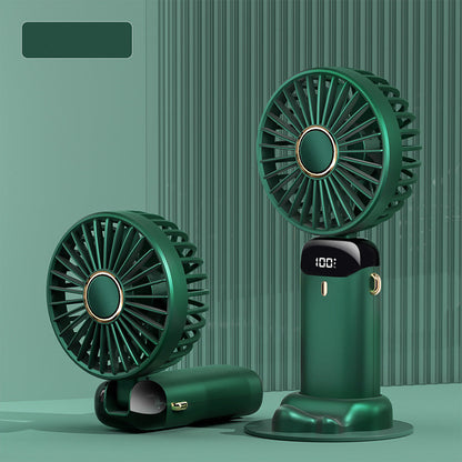 Two green handheld fans on a green background