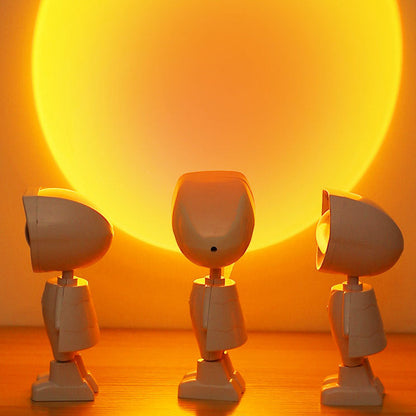 Three small robot sunset projector lights