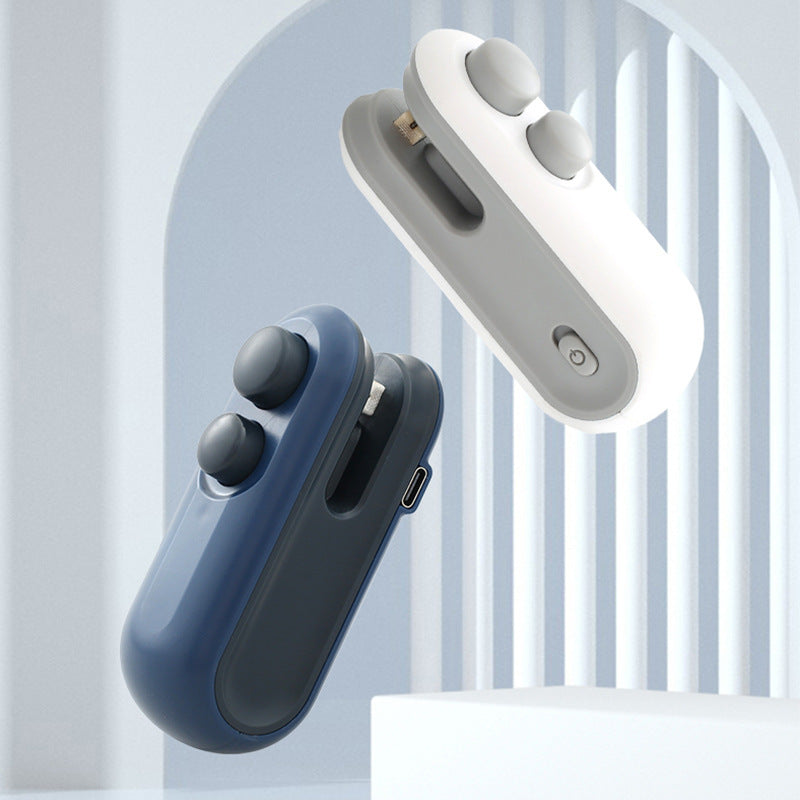 Two mini bag sealer, one blue and one white, on a light gray background.